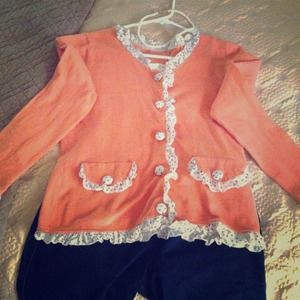 Peach Cardigan with polka dotted ruffles