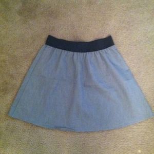 Gray skirt.