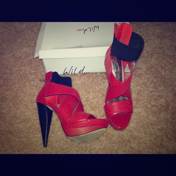 Wild Pair red snakeskin heels