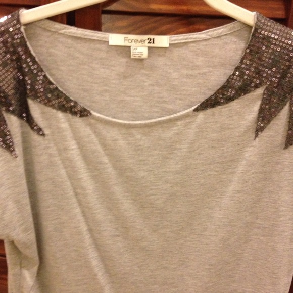 Gray shirt with charcoal sequins on the shoulders