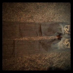 Darker wash silver jeans. Suki fit.