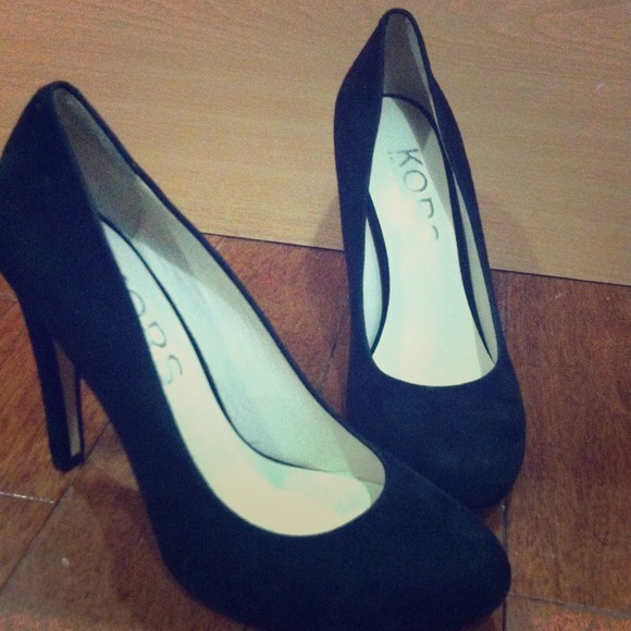 Black suede Michael Kors heels. Beige color under.