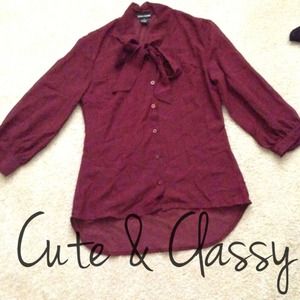 NW Burgundy plum sheer top with 3/4 sleeves.