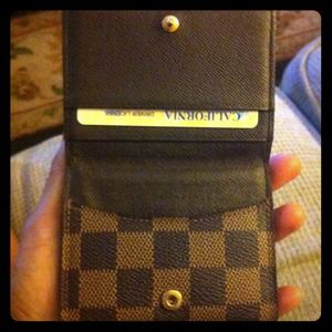 SOLD 💯% Authentic LV, Damier Ebene Ludlow Wallet.