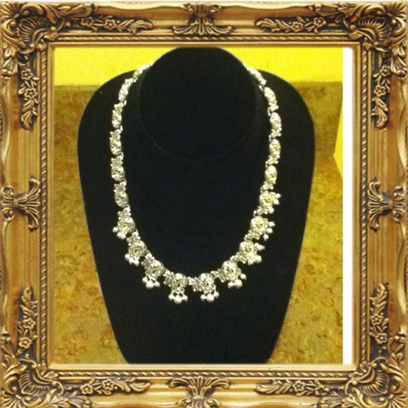 Charm like necklace and earring set