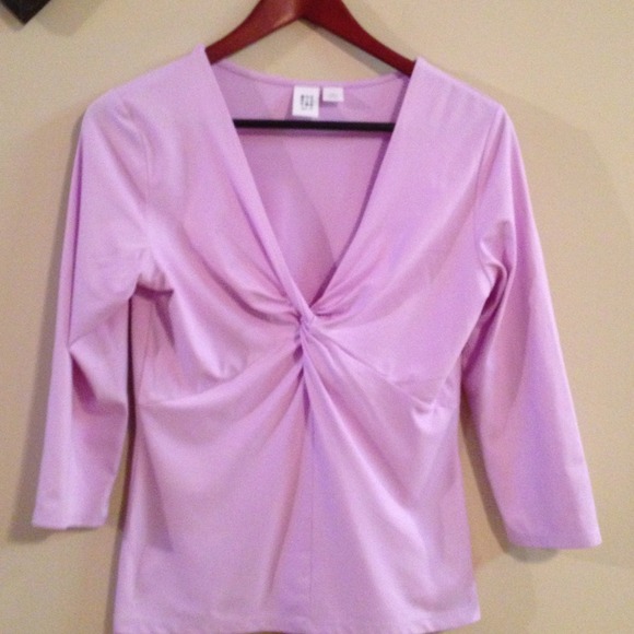 Light purple top. Apt 9