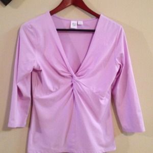Light purple top. Apt 9