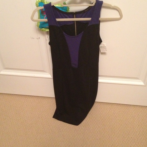 Black and blue dress on hold