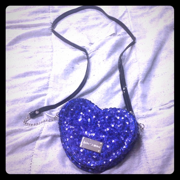 Blue sequined heart-shaped Betsey Johnson purse.