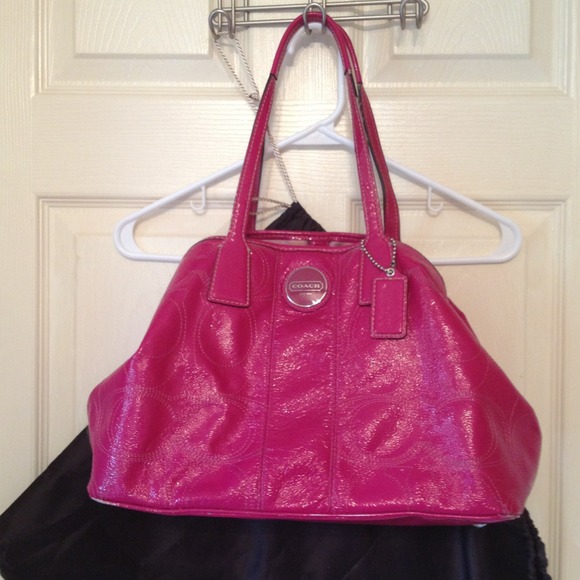Pink leather Coach bag signs of wear shown in pics