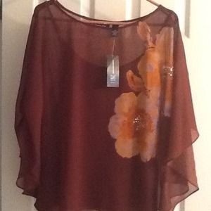 Polyester  top with a  camisole under
