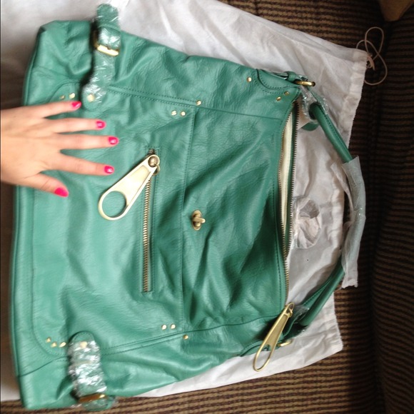 Turquoise zippers bag