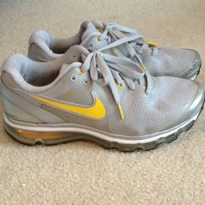 Gray and yellow Nike Livestrong sneakers