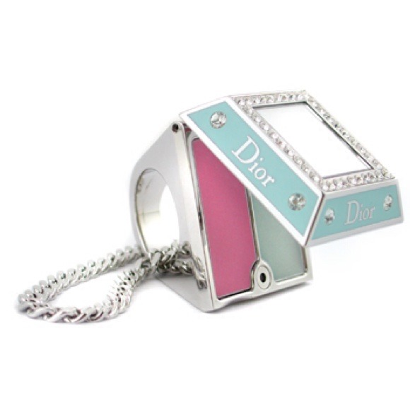 Dior Accessories - Dior ring and Blue Prada blouse.