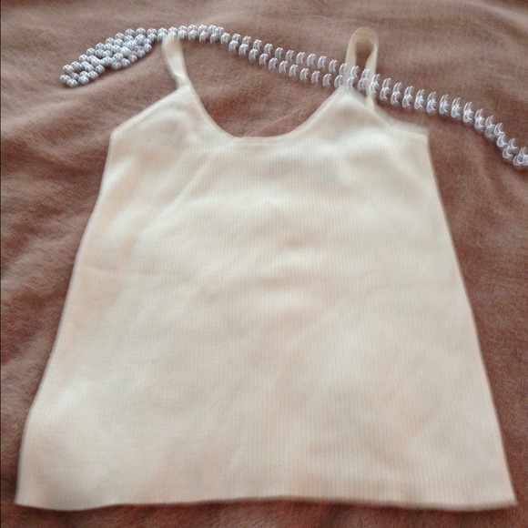 Sold Cream colored sweater tank top.