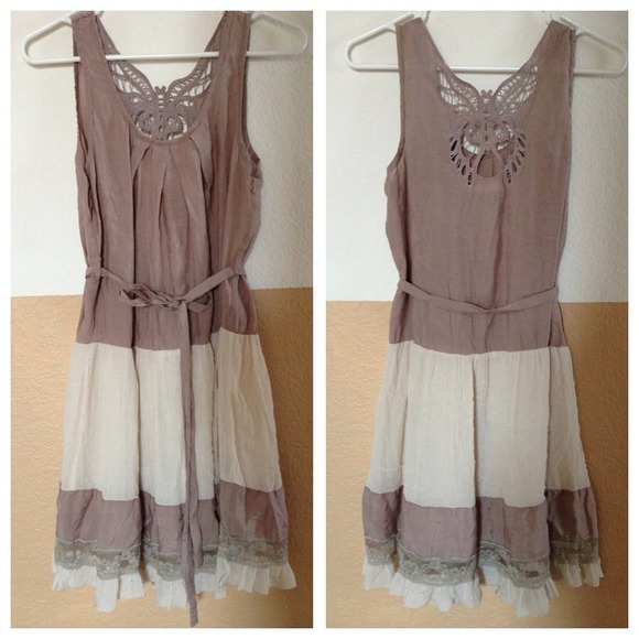 Beautiful summer dress with butterfly detail.