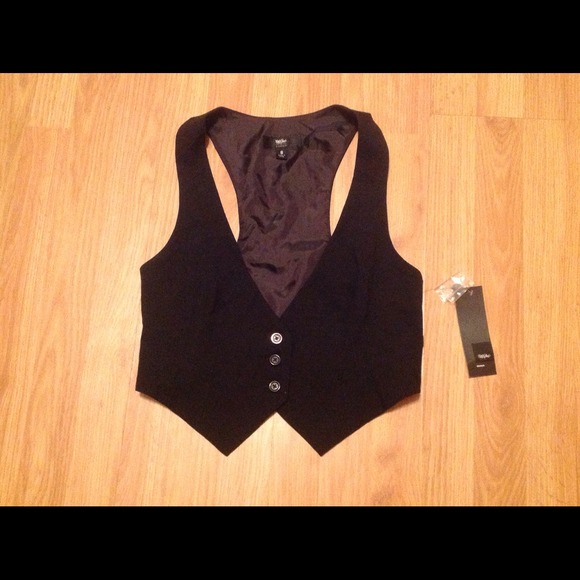Black vest.