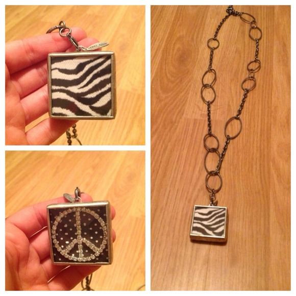 Two sided charm w/ chain linked gunmetal necklace.