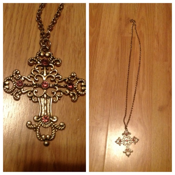 Cute gold necklace with cross.