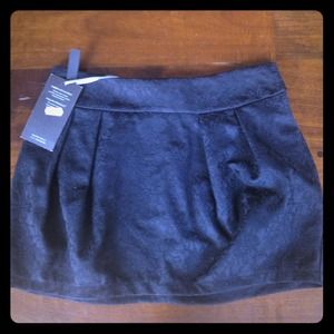 Black mini skirt from Spain.