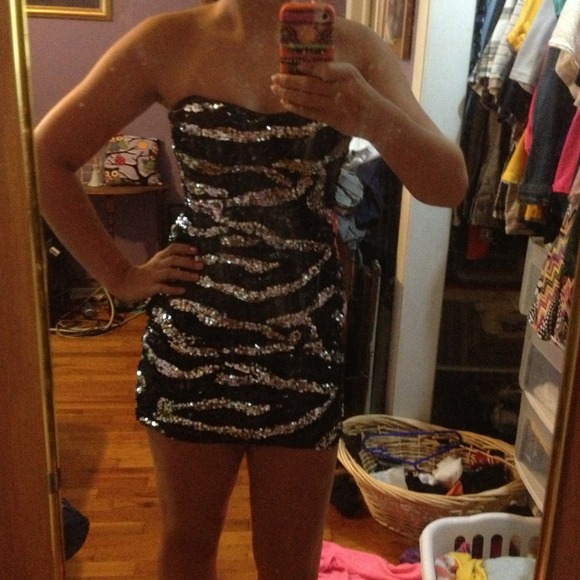 Zebra stripped strapless sequin dress.