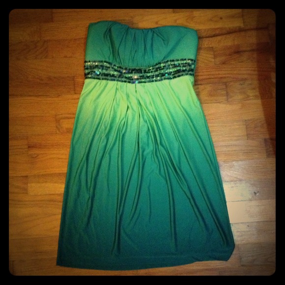Green strapless dress.