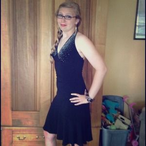 Little black dress with jewels on the chest.