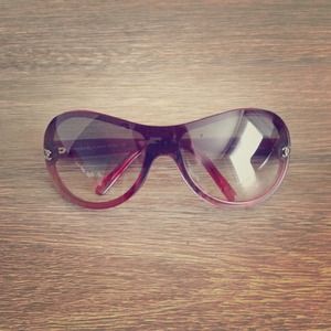 CHANEL Authentic red sunglasses with case.
