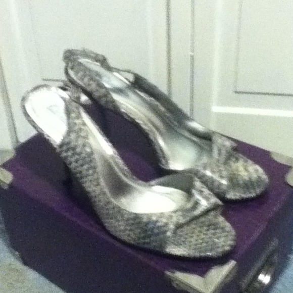 Snake skin pumps