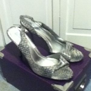 Snake skin pumps