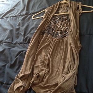 Grey flowey vest. Back detail.