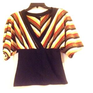 Loose shoulder fitted waist