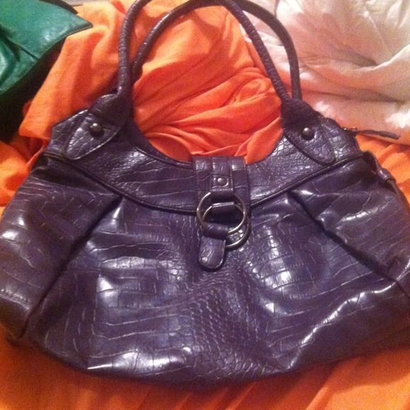 Deep purple leather handbag