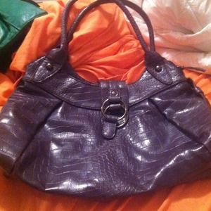 Deep purple leather handbag