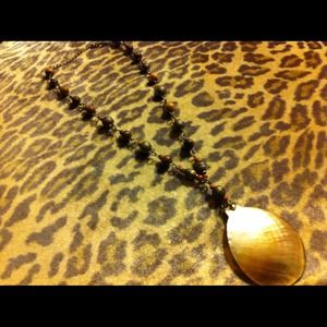 Beaded necklace with seashell