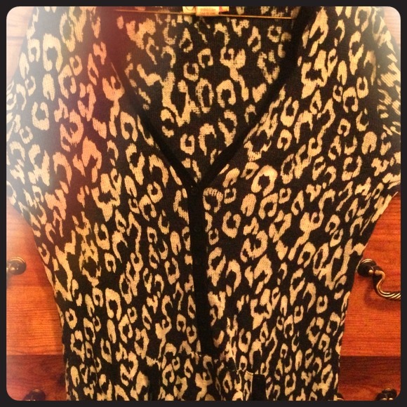 A cheetah print black an white light sweater!