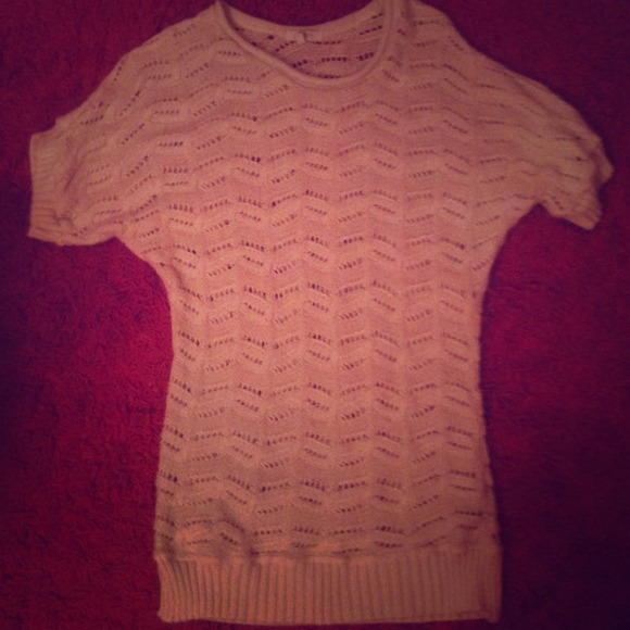 Cream colored knit tunic