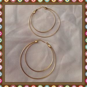 Hold Gold tone hoop earring