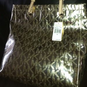 SOLD Reduced !!Brand new gold Michael kors tote
