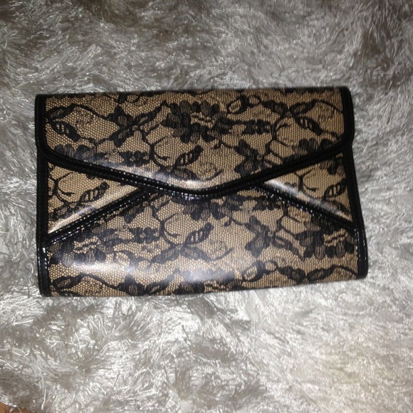 ALDO Black N tan clutch. Never worn.