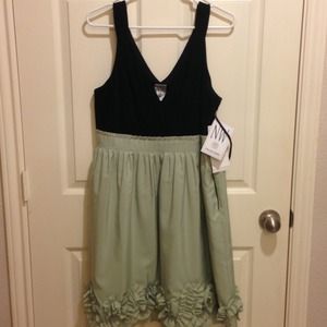 Party dress with hemline embellishment