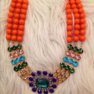 Orange beads with blue rhinestones