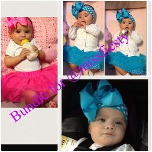 Pink tutu, blue tutu with blue headband.