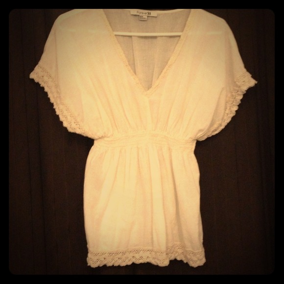 Cream frilly top