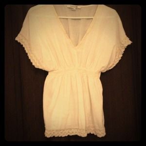Cream frilly top