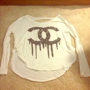 Chanel dripping C's shirt.