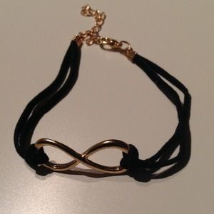 Infinity bracelet with black leather.