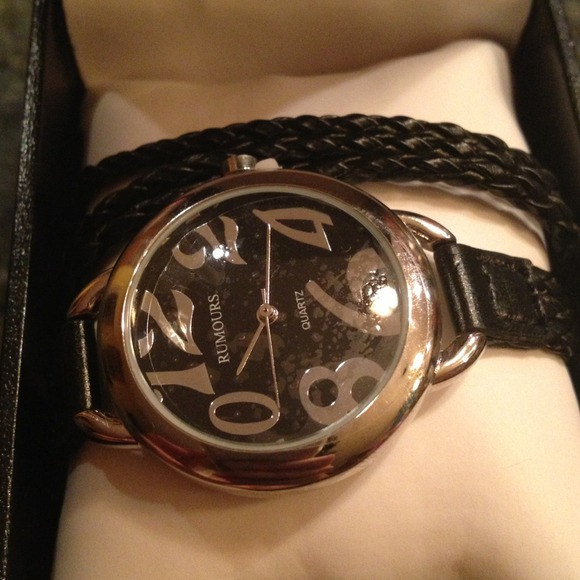 Sliver watch with black straps ⌚