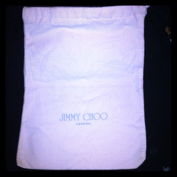 100% Authentic Jimmy Choo cream duster. Hurry!!!