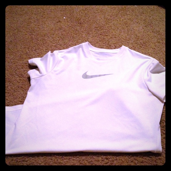 White Nike dri-fit top. 👑